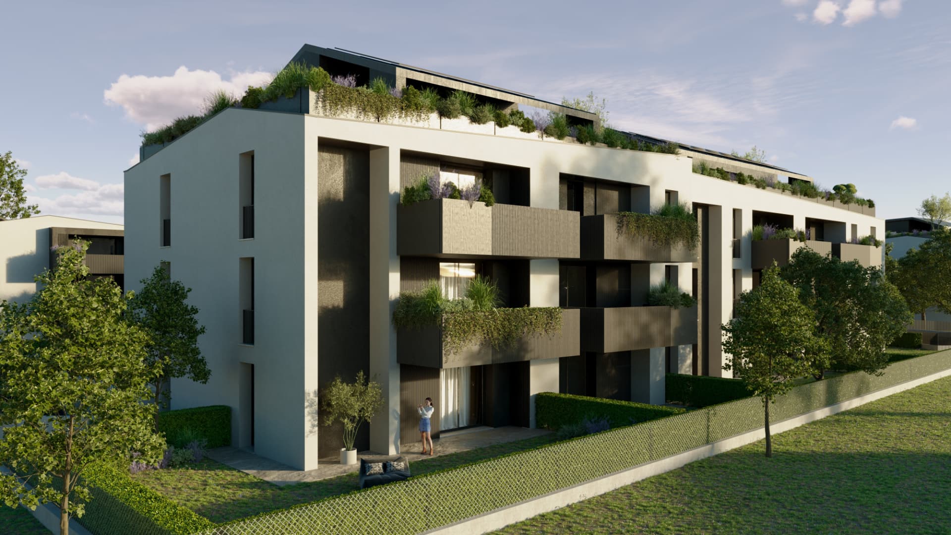 Render del nuovo complesso residenziale in zona San Vincenzo a Oderzo: facciate chiare, logge in listelli e tetti verdi