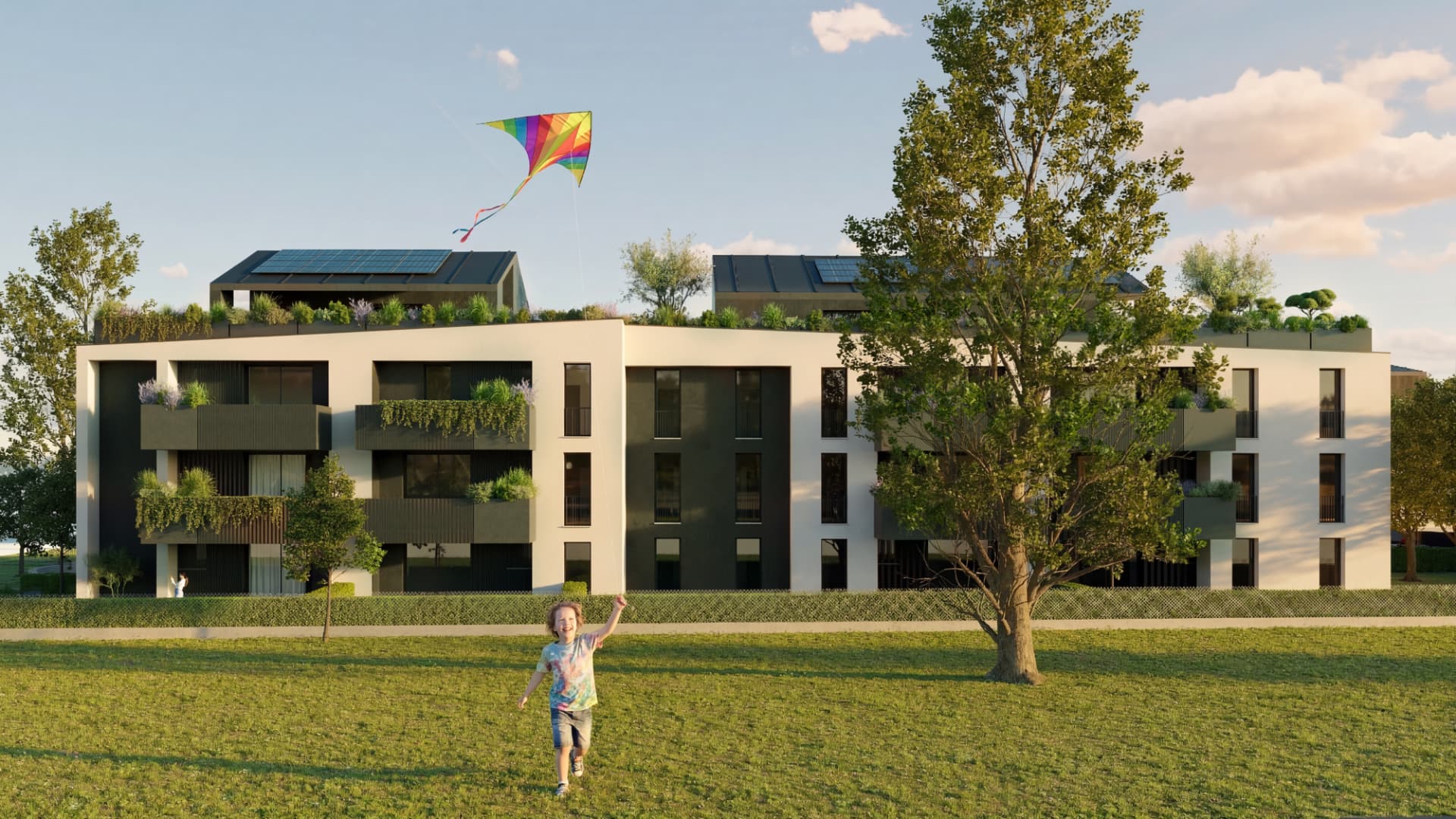 Vista dal parco del nuovo residenziale a San Vincenzo, Oderzo, con impianto fotovoltaico in copertura